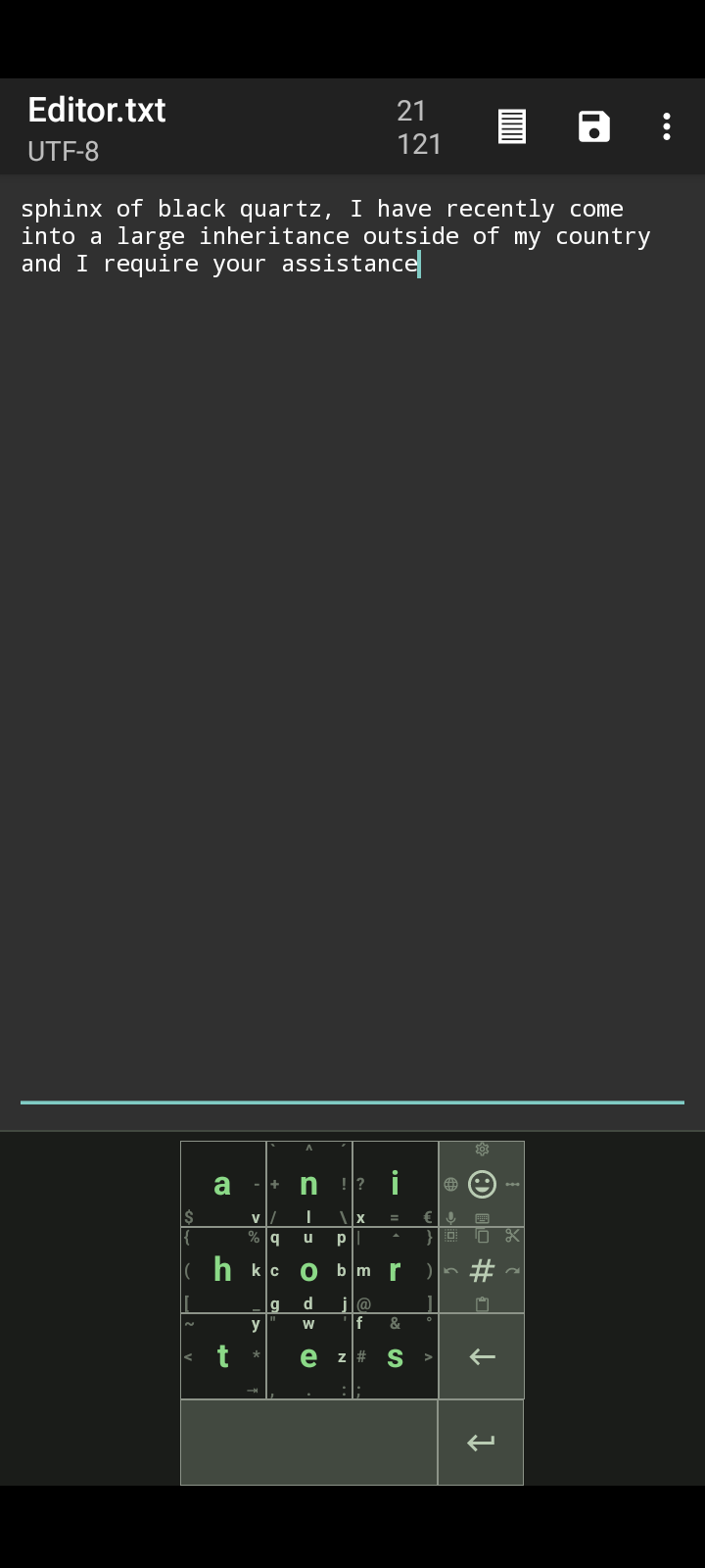 a phone screenshot, showing a text editor and an on-screen keyboard. the keyboard has large, square keys, with a 3 by 3 grid in the center and 5 additional keys along the bottom and right edges. the entered text reads 'sphinx of black quartz, I have recently come into a large inheritance outside of my country and I require your assistance', referring to the Nigerian Prince email scam cliche.